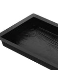 Close-up of a black stone mold from 2 Pack Walk Path Maker Stone Mold Paving Paver Molds For Concrete Reusable Walkways For Patio Lawn Garden Easy To Use