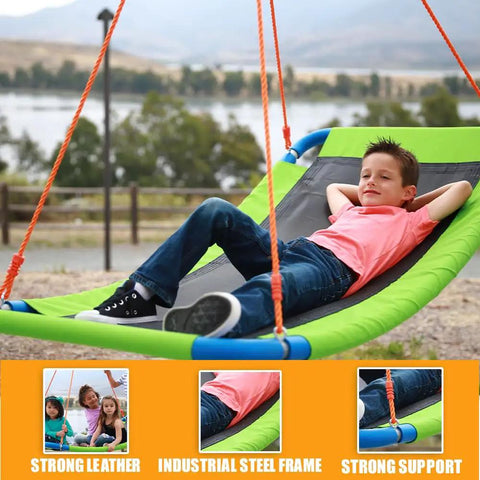 Boy relaxing on Platform Swing Giant Rectangular Saucer for Kids and Adults with industrial steel frame, backyard ready