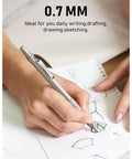 Person using 0.7mm Metal Mechanical Pencil Set With Case Three Pack MP1000 Pro Grade Drafting Kit for sketching on paper