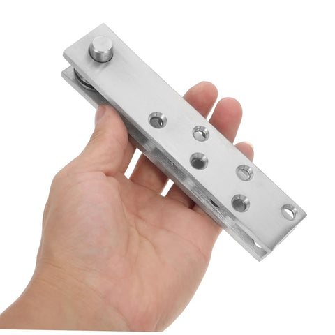 Heavy Duty Hidden Hinges For Doors Made Of Stainless Steel 360 Degree Pivot Hinge System held in hand, showing concealed design.
