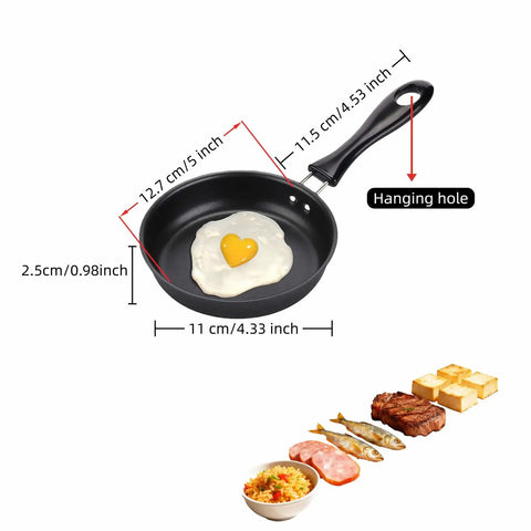 4.7 Inch Mini Frying Pan Nonstick For One Egg Breakfast with heart-shaped egg, flat bottom, hanging hole, and measurement details.