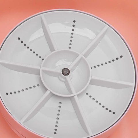 Top view of the spray arm for the Pink Compact Countertop Dishwasher With 360 Degree Rotating Spray And Fifteen Minute Automatic Shutoff.