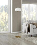 Tall Floor Lamp With Glass Mushroom Shade In Brass and White Milk Glass next to sofa, 8-foot cord visible, ideal for living room