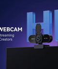 Crisp 1080P HD Webcam With Clear Mic And Noise Cancellation Ships With Wide Angle Lens Auto Light Correction Plus Privacy Cover, mounted on monitors.