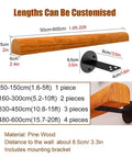 Tough As Nails Adjustable Metal Railing Posts And Wooden Railing Set For Floor Mount with pine wood and black bracket detail.