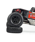 Crush The Trails With These Sick 1.9 Carbon Fiber Beadlock Wheels For RC Crawler Cars Featuring CNC Aluminum Hubs Quick Tire Swaps And Black Finish SCX10 TRX4 Gmade on RC model with stacked tires.