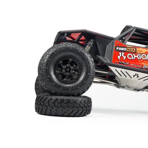Crush The Trails With These Sick 1.9 Carbon Fiber Beadlock Wheels For RC Crawler Cars Featuring CNC Aluminum Hubs Quick Tire Swaps And Black Finish SCX10 TRX4 Gmade on RC model with stacked tires.