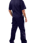 Men Short Sleeve Coveralls Navy Blue Jumpsuit With Two Way Antistatic Zipper And Locking Snap Closures rear view showing durable fabric and utility pockets.