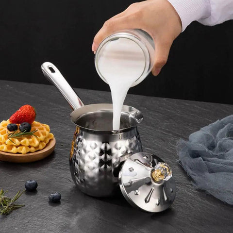 Pouring milk into the Turkish Coffee Pot Cezve Ibrik 200ml Stainless Steel Stove Top Brewer With Spout For Espresso And Traditional Turkish Coffee