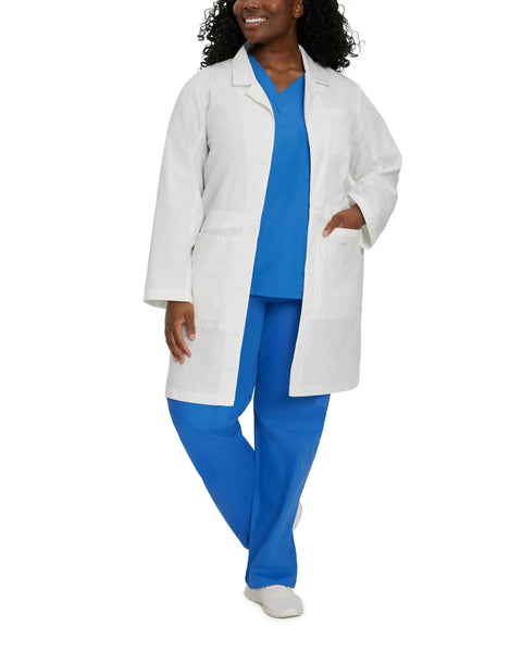Relaxed Fit Five Pocket Three Button Full Length White Medical Lab Coat For Women worn over blue scrubs, featuring a relaxed fit and five pockets.