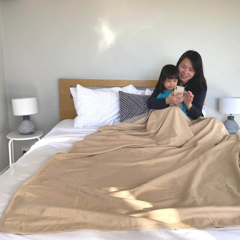 EMF Shielding Large Bed Blanket Made From Organic Cotton With Silver Lining for daily sleep protection on family bed, 57 by 78 inches.