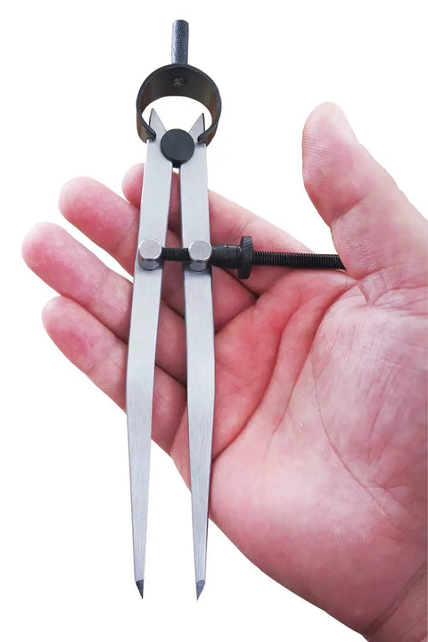 Heavy Gauge Adjustable Wing Divider Locking Steel Compass Six Inch Legs held in hand, precise layout tool for various crafts.
