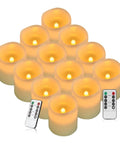 Flameless Battery Operated Pillar Candles Set Of 12 Real Wax Pillars With Dancing LED Flames 3 Inch By 4 Inch Ivory displayed with remotes