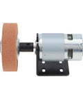 RS775 Compact DC Motor Sander Polisher Kit 12V 24V 120W Brushed Build With 5Mm Shaft mounted on a black plate with corundum wheel.
