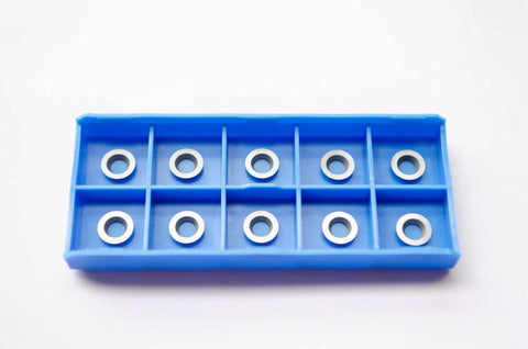 Top view of blue plastic organizer tray with ten round carbide cutter tips for YURIKAI 1/3 in woodturning tools
