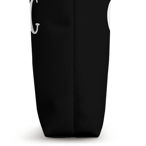 Side view of black tote bag included in Elf Rowing Shirt Family Matching Pajama Set For Christmas Funny Holiday PJ Outfit