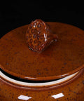 Top view of Big Boy Ceramic Rice Jar With Rattle Proof Lid Heavy Duty Porcelain Kitchen Dispenser featuring a unique textured lid.