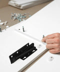 Spring Loaded Cabinet Door Hinges Pair For Folding Beds And Sofas Beefy Steel Construction Black Finish installation close-up