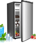 Heavy Duty Upright Freezer With Single Glass Door Hella Spacious Storage Shelves showing drinks and fresh produce on shelves.