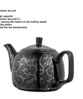 Black ceramic teapot with swirling design, 1L capacity, part of the Boss 220V Electric Turkish Tea Maker With 3L Stainless Steel Boiler And 1L Ceramic Teapot Dual Teapot Samovar With Keep Warm Function For Tea Or Coffee White.