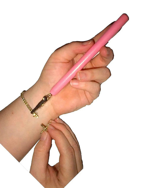 Pink Bracelet Fastener Tool For Easy Jewelry Clasping, Sturdy Steel Clip With Hardwood Handle in use clasping a bracelet