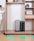 Woman moving cabinet with Lifter Furniture Sliders For Hardwood Floors With 360 Degree Wheels Beefy Heavy Duty Moving Dolly