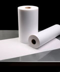 Terpene-Resistant PTFE Roll For Chef-Grade Kitchens And Lab-Precision Extractions, showcasing two rolls on a reflective surface.