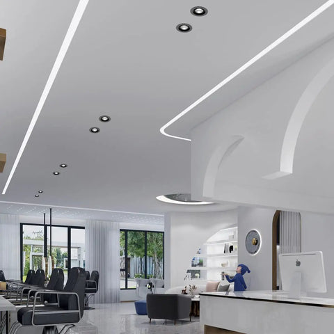 Modern office space with Cool 3 Inch Recessed LED Downlight Kit in black, adjustable gimbal eyeball, installed in the ceiling.