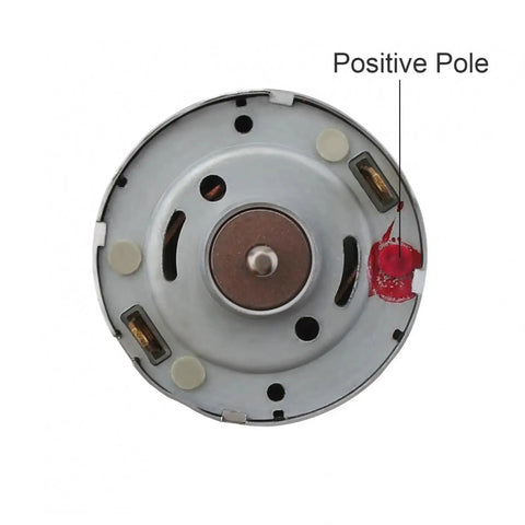 Cool 390 DC Motor With 12V Power Hit 22k RPM And Huge Torque For Robotics Or Automation Projects, showing the back with positive pole labeled.