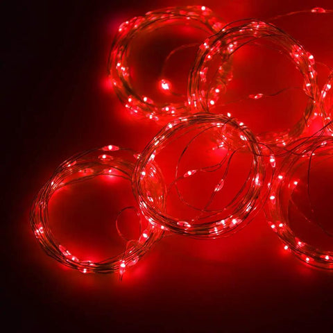 300 LED Curtain String Lights with USB Power and Remote Control coiled red lights on a dark background
