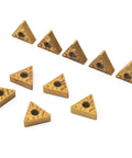 TNMG160408 HQ LF9011 TNMG332 carbide turning inserts for steel 10 pack, indexable lathe blades gold color arranged on white surface.