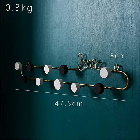 Top Tier Wrought Iron Letter Wall Hooks Slick Gold Finish Heavy Duty Coat And Key Hangers Modern Entryway Decor wall hooks with circular accents