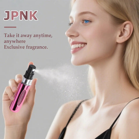 Woman using pink Super Portable Mini Refillable Perfume Atomizer Bottles Set - 5 Pack Of Travel Size 5ml Spray Options With Handy Bag