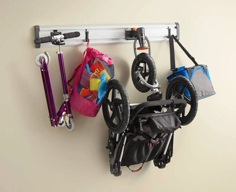 Advanced Bike Storage System V3 Claw for garages holds strollers, scooters, and bags on a wall mount for quick access.