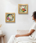 Two Pack Flower Butterfly Punch Needle Kit Set With Frames For Beginners displayed on wall, 9.4 by 9.4 inches, flowers and butterflies pattern.