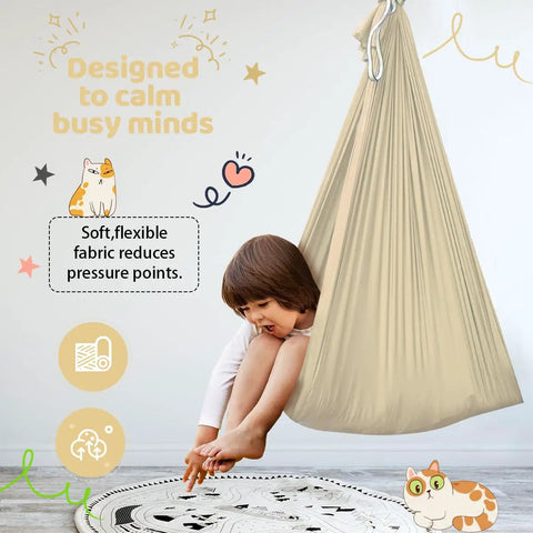 Kid Friendly Sensory Swing For Indoor And Outdoor Use 300 Lb Weight Capacity Hanging Therapy Swing With 360 Degree Swivel Hanger Kit Calming Effect For Autism ADHD SPD Beige with child enjoying calm moment in a beige swing, soft fabric promoting relaxation.