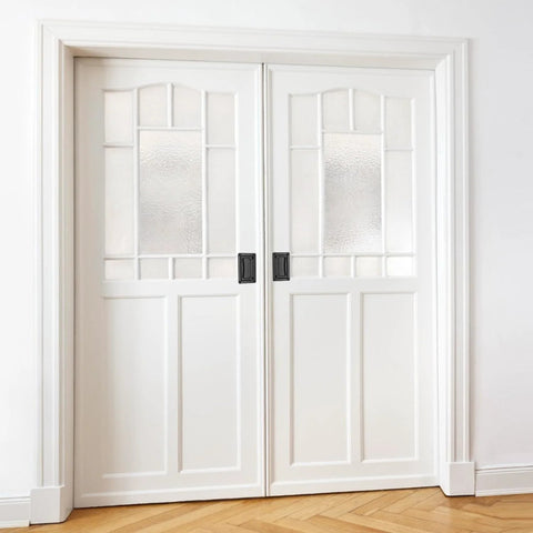 White double doors with Six Pack Zinc Alloy Recessed Pull Handle 4.4 By 2.7 Inches Flush Lift Door Handle in black installed.