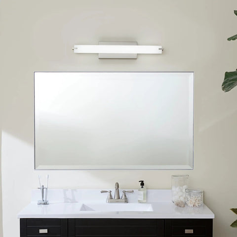 LED Linear Bathroom Vanity Light In Brushed Nickel Finish mounted above a mirror, showcasing even illumination for modern makeovers.