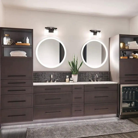 Two-Light Marette 13.5-Inch Vanity Light in Brushed Nickel with satin etched opal glass illuminating bathroom with mirrors.