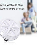 Compact Portable Mini Washing Machine With Turbine Tech For Clothes And Dishes Featuring Remote Control And Four Speeds viewed from side angle.