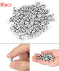 100 Piece Kit Of 8X10Mm Heavy Duty Tire Stud Screws Hella Tough Anti Slip Nails For Cars Atvs Utvs And Motorcycles in hand and pile of screws.