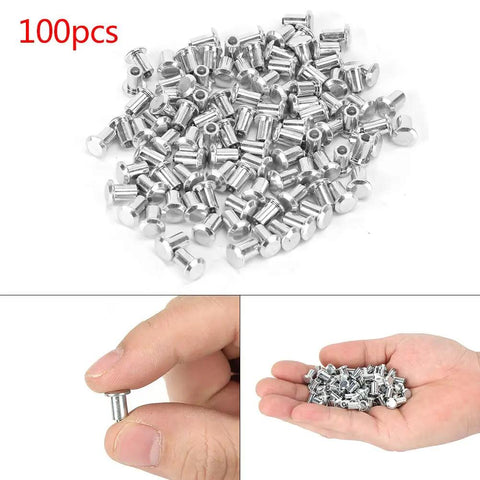 100 Piece Kit Of 8X10Mm Heavy Duty Tire Stud Screws Hella Tough Anti Slip Nails For Cars Atvs Utvs And Motorcycles in hand and pile of screws.