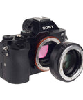 0.71x Focal Length Reducer Speed Booster For Nikon F To Sony E Mount Cameras Gear Adapter Ring next to Sony camera body