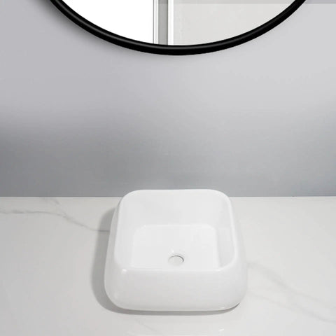 USZWBY Vessel Sinks Modern Minimalist Creative Sink Home Art Above Counter Basin Balcony Bathroom Ceramic Wash Bathroom Bowl Sink on marble countertop with mirror.