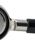 Close-up of Bottomless 58mm Portafilter for E61 Group Heads with stainless filter basket, compatible with Rancilio Expobar machines.