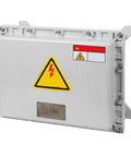 Front view of outdoor explosion‑proof electrical enclosure, gray metal IP66‑rated box with hinged cover and warning labels