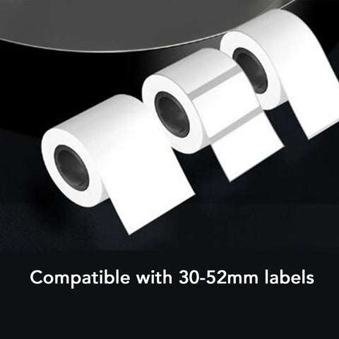 Cool Retro Label Printer With Bluetooth 5.0 Connectivity And Compact Design Perfect For Home Office Organization Tasks Features Inkless Thermal Printing Technology Compatible With A Range Of Paper Widths From Thirty Two Millimeters To Fifty Two showcasing rolls of white label paper compatible with 30-52mm sizes.