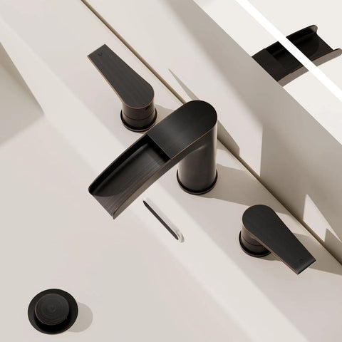 Oil Rubbed Bronze Waterfall Bathroom Faucet Dope All Metal Build 8 Inch Widespread 3 Hole Modern Design With Pop Up Drain And Included Water Supply Line 304 Stainless Steel NS WF005ORB installed on a white countertop.