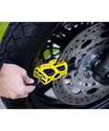 Granit Sledg 77 Web Disc Lock Yellow Built Tough For Maximum Security With 13 Mm Hardened Steel Bolts Solid Lock Body in use on bike