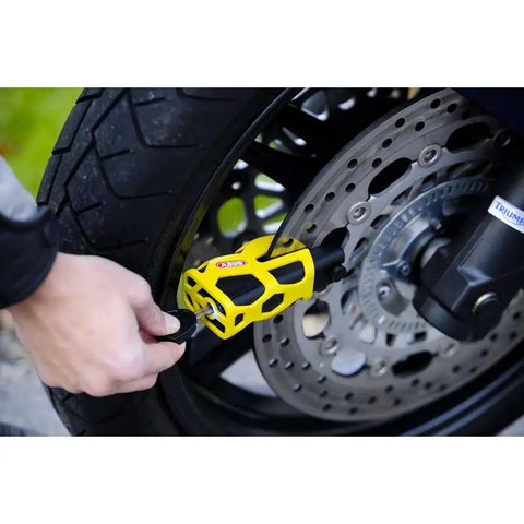 Granit Sledg 77 Web Disc Lock Yellow Built Tough For Maximum Security With 13 Mm Hardened Steel Bolts Solid Lock Body in use on bike